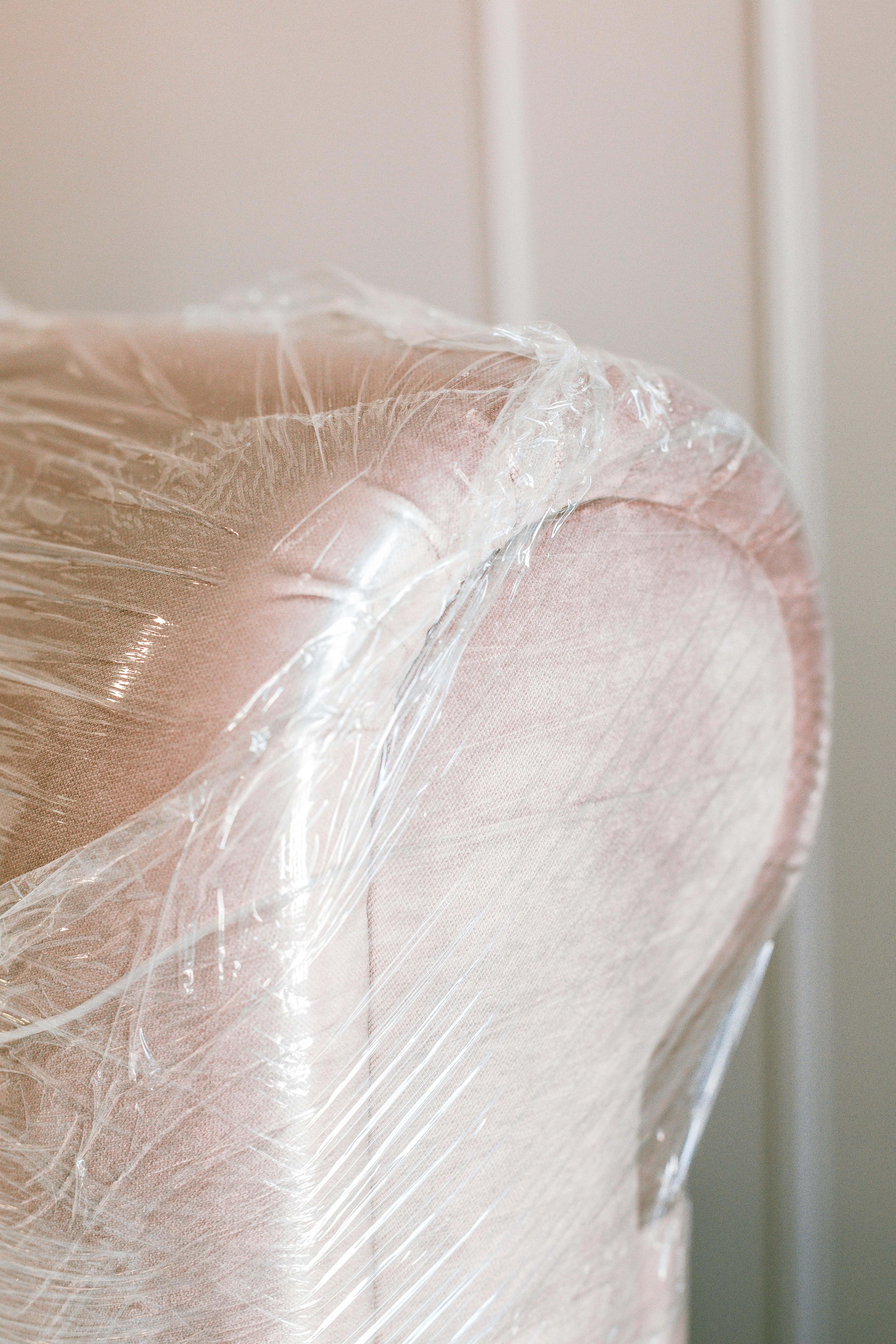 Transformation of Couch with Pink Velvet Slip: Before and After Reveal, Showcasing a Remarkable Makeover, Turning a Worn-out Piece into a Brand-new Lookalike.