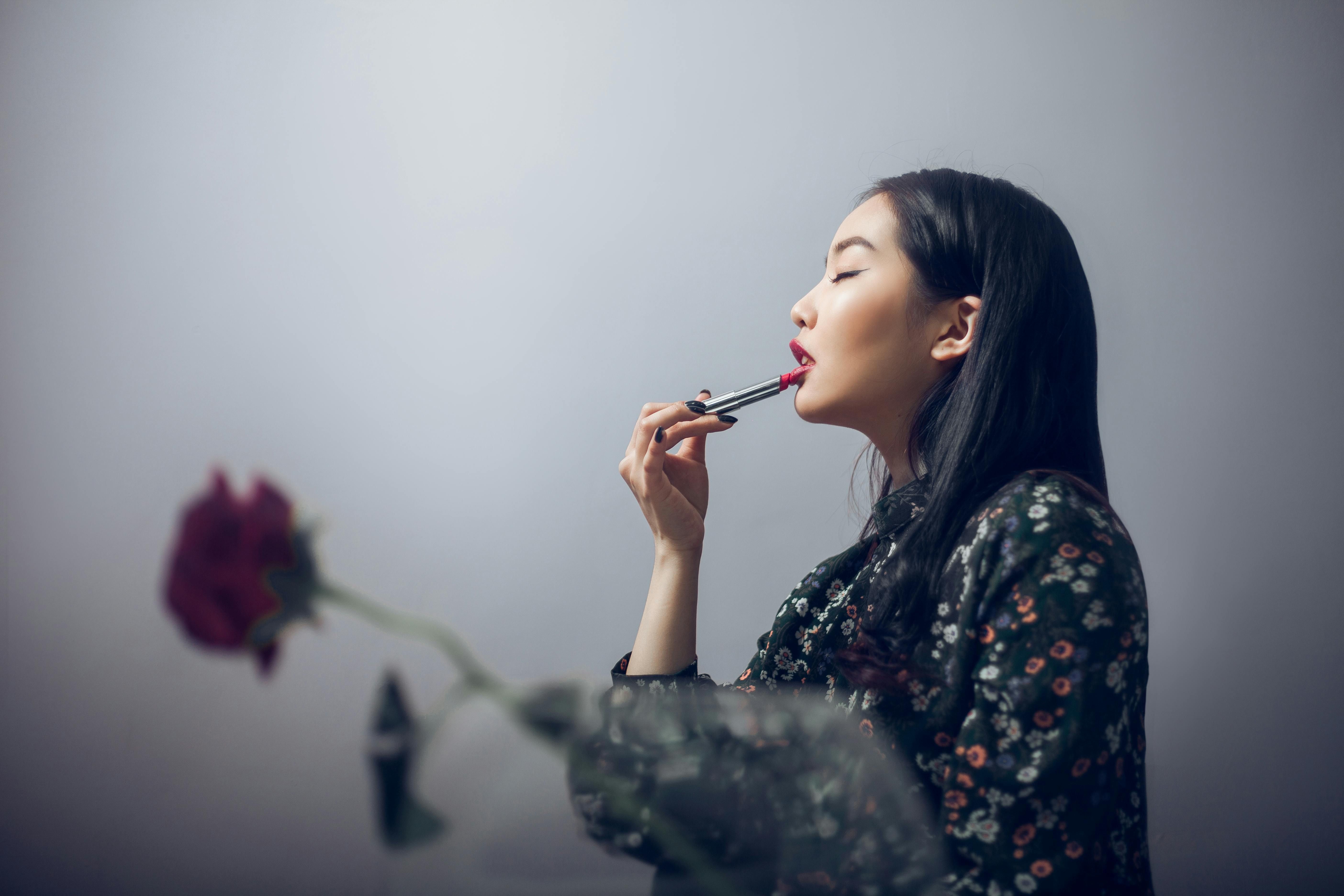 A model showcasing a lip-staining product. A model sporting lip color staining