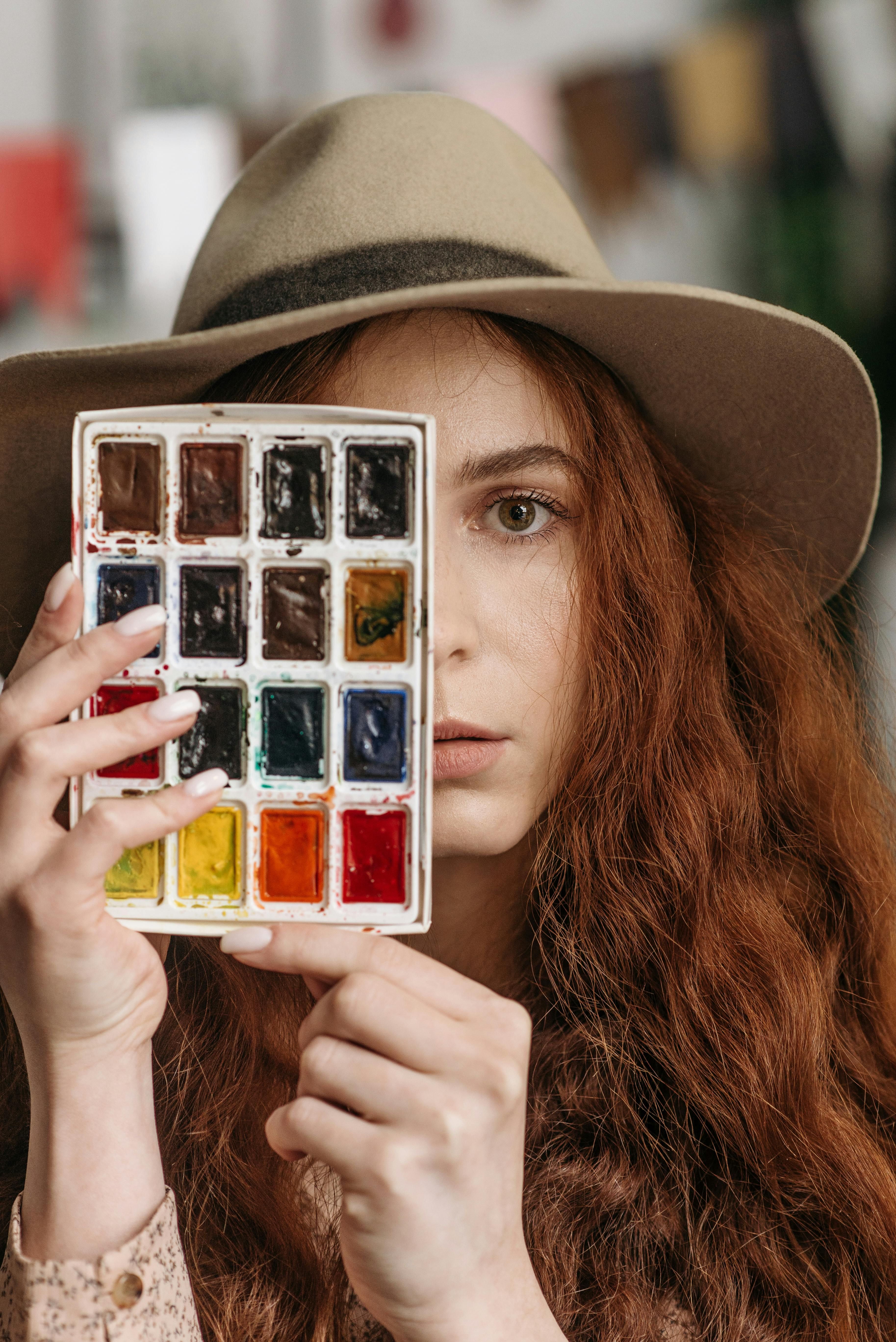 Model showcasing an oversized hair claw adorned with intricate, subtle multicolored swirls. Stylish, Oversized Hair Claw Showcasing Delicate, Vibrant Spiral Patterns Adorns a Model's Tresses