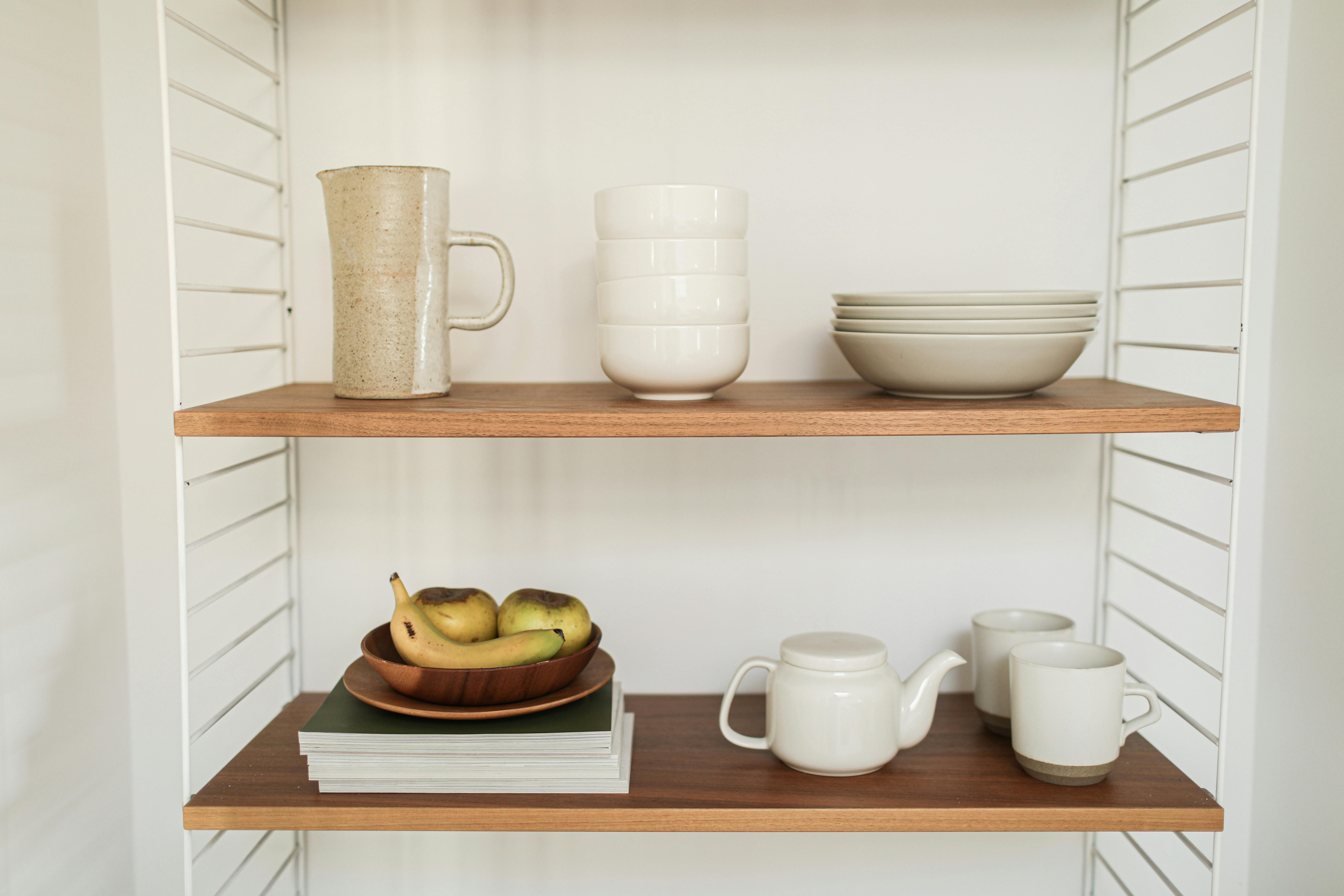 Rotating spice organizer in use Revolving kitchen organizer adorned with various spices