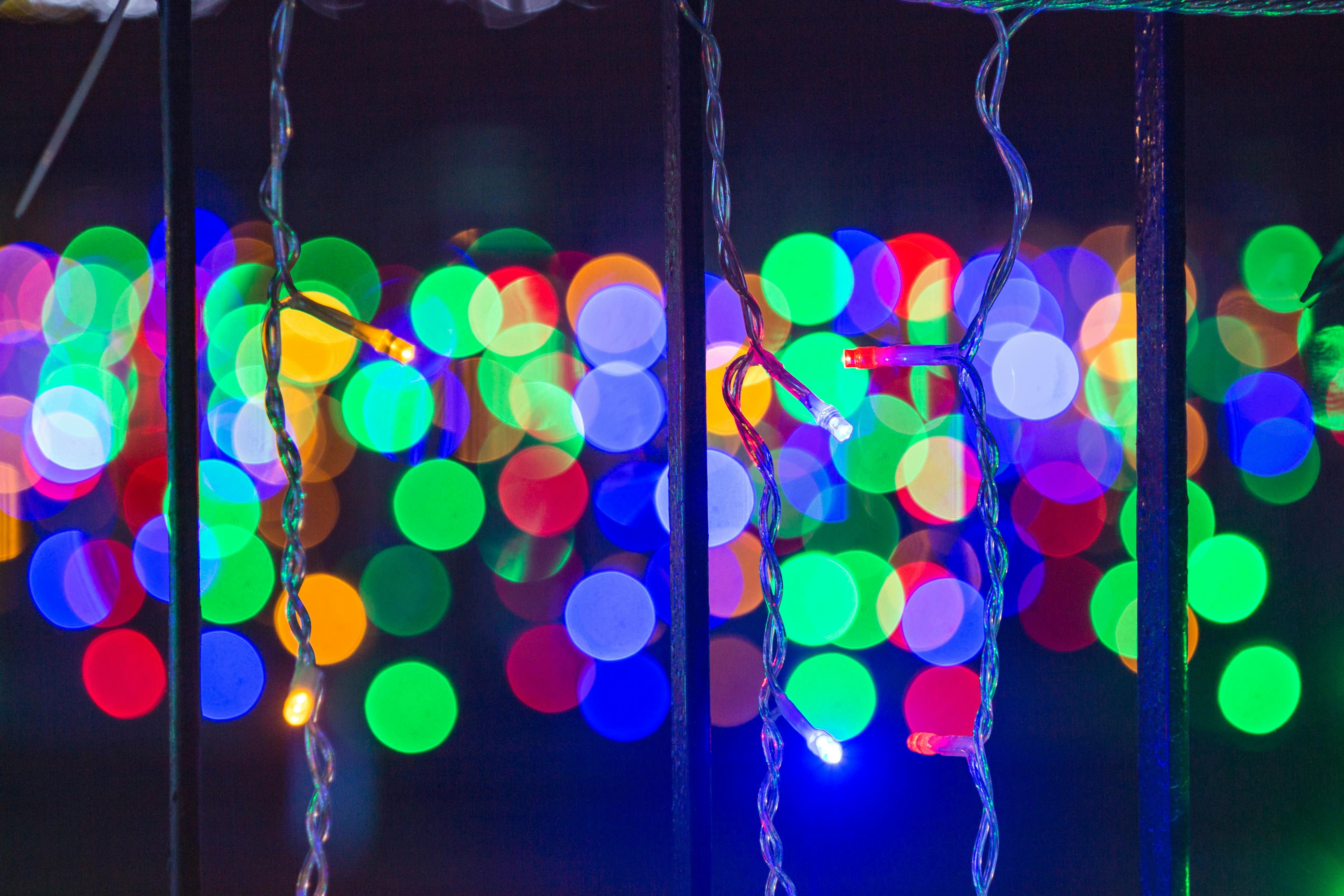 Two LED+ Color light bulbs packaged together, showcasing multi-hued illumination capabilities, with a display of 800 lumens brightness on the box. Package of 2 GE LED+ Color Light Bulbs: Highlighting multicolor lighting options, boasting 800 lumens brightness on product packaging.