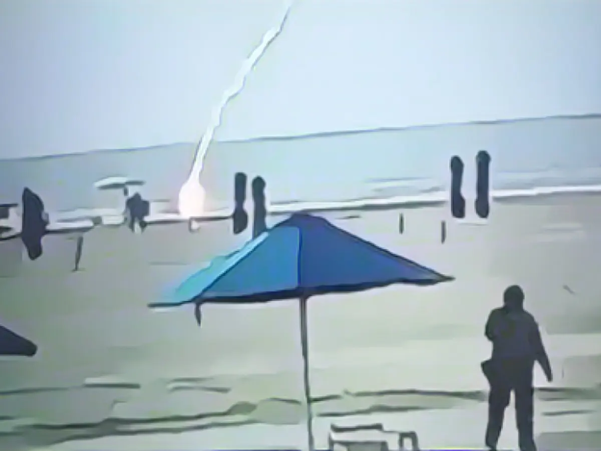 Mother (34) struck by lightning on the beach