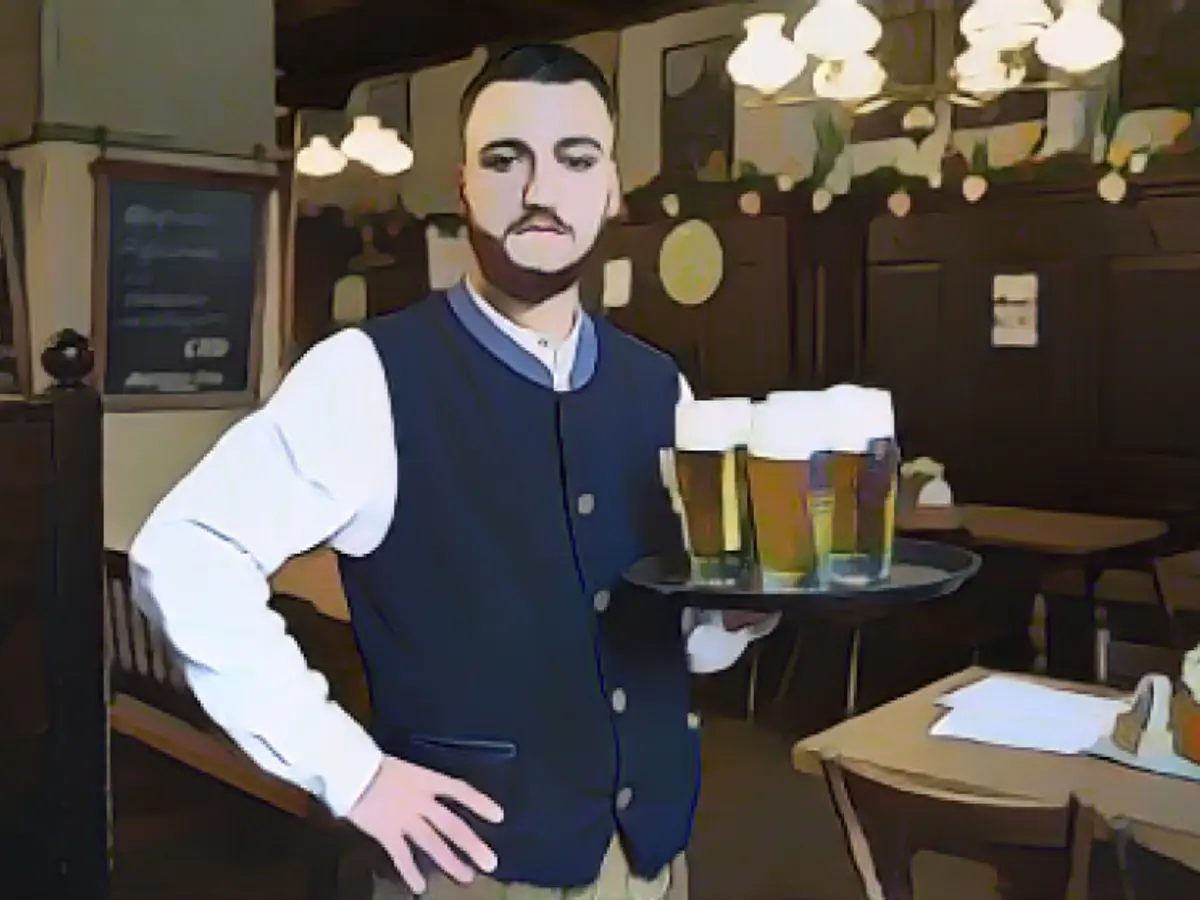 So the hard-working waiter can stay in Germany