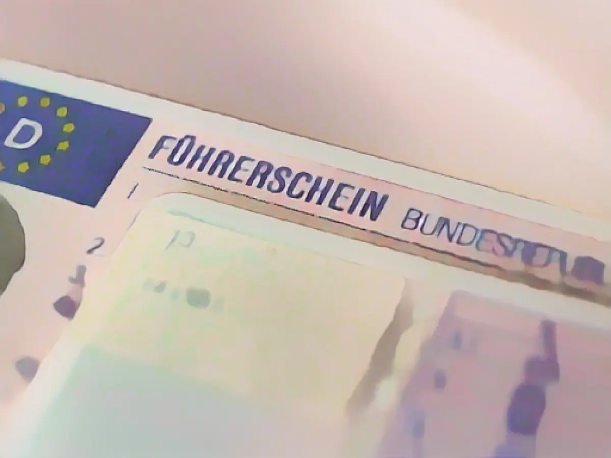 Driver's license test: man cheats with camera and ear studs