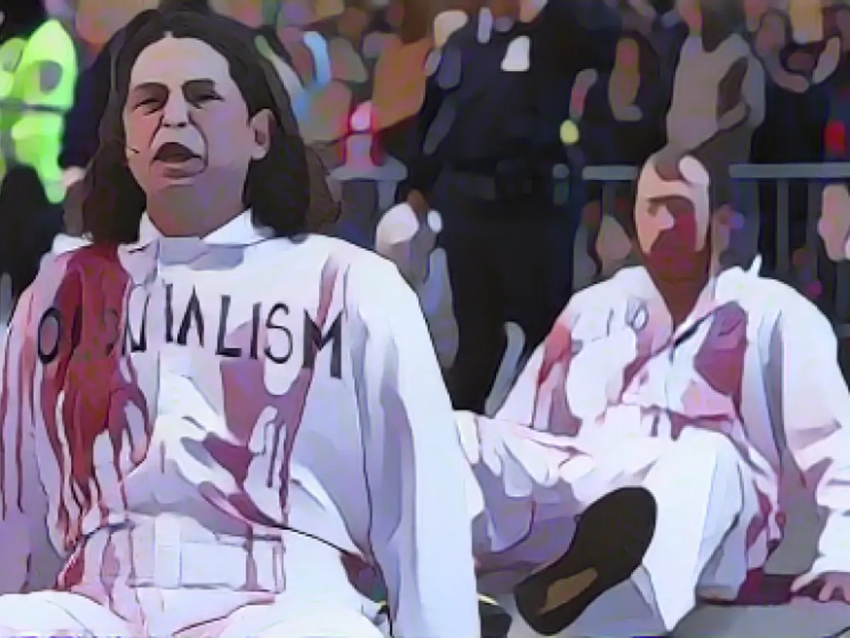 Activists disrupt Thanksgiving parade