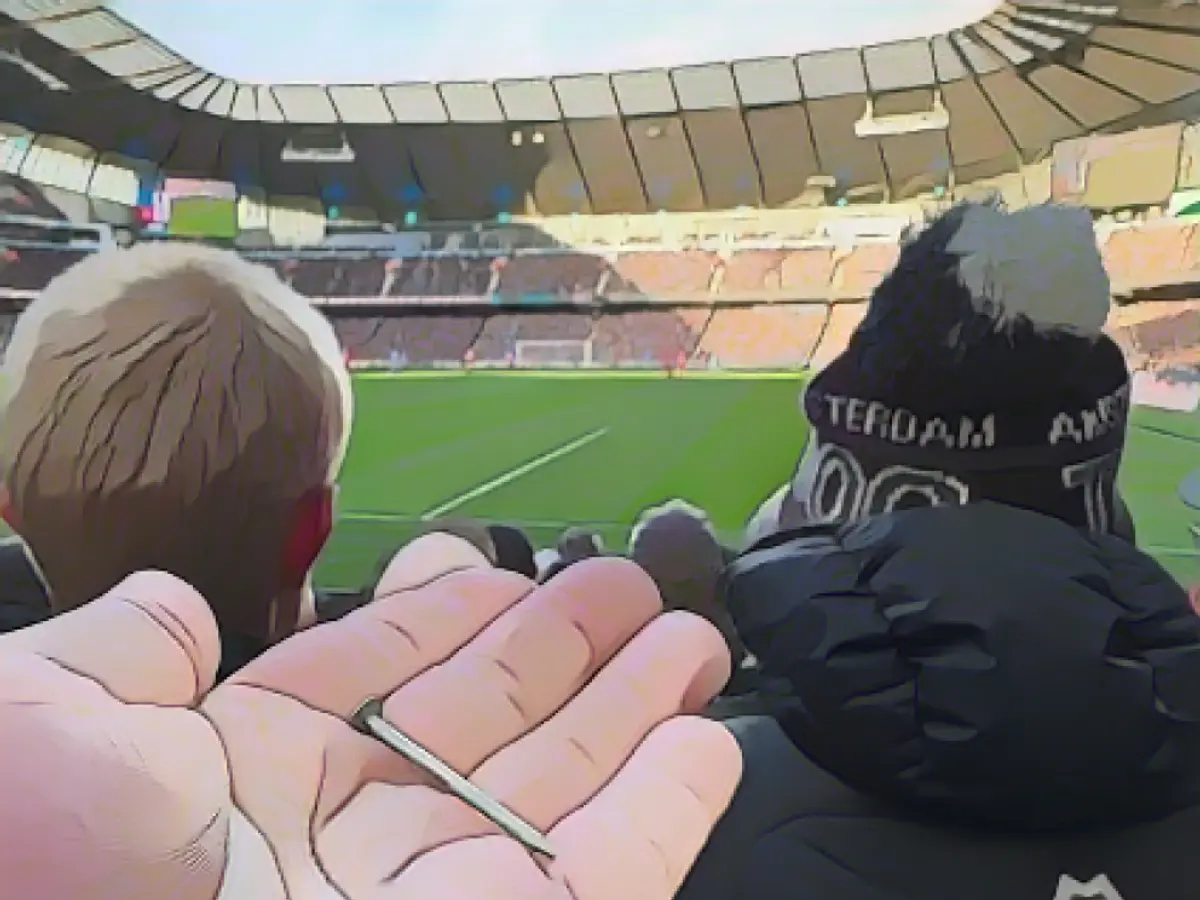 Liverpool fans pelted with nail?