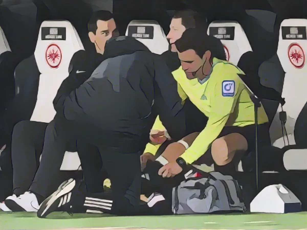 Referee Brych sets record and has to retire injured