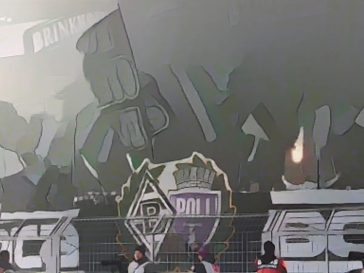 Gladbach fan (21) critically injured