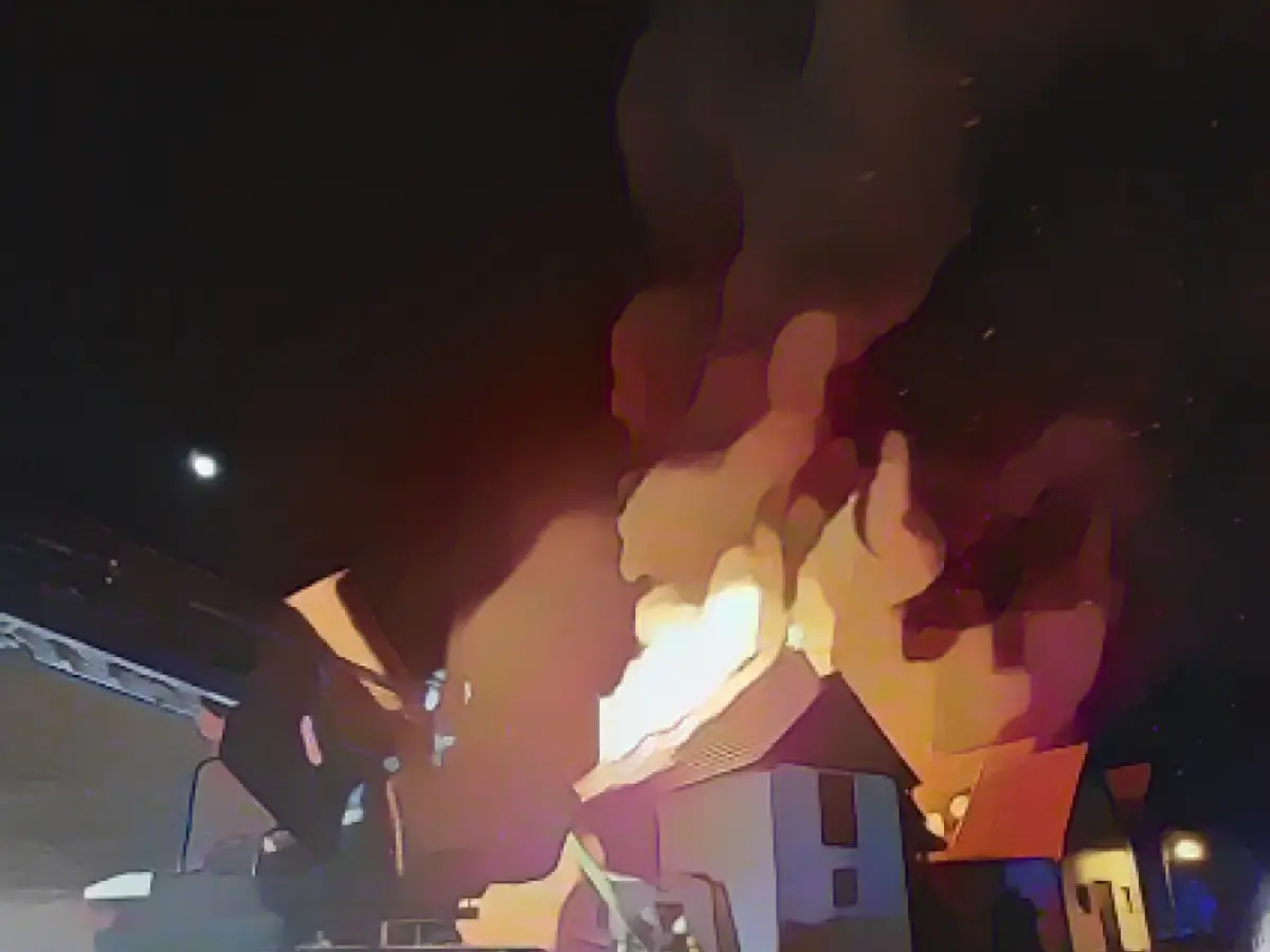 Rescuers find body in flaming house