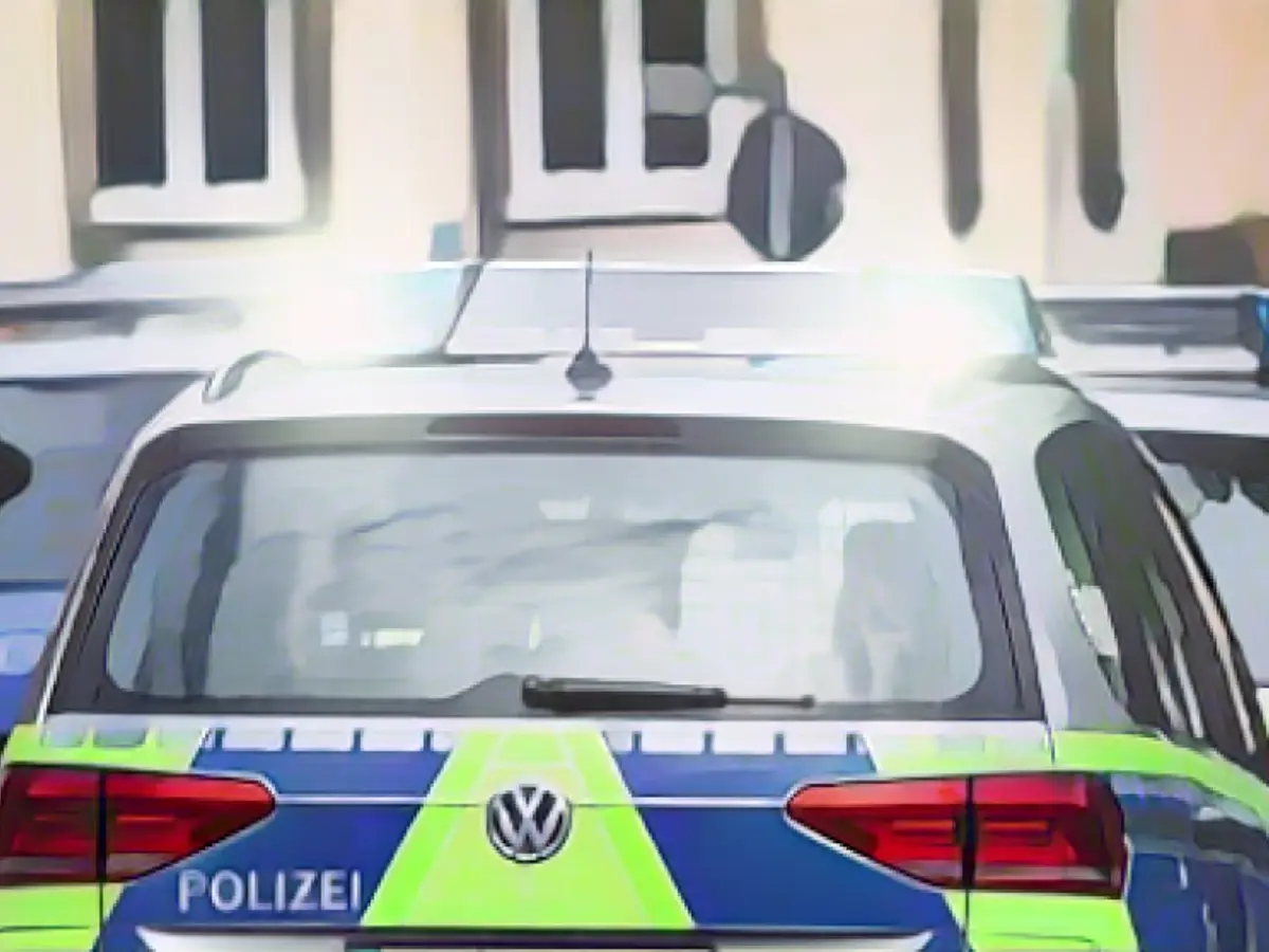 Police officer suspended after alleged wolf salute