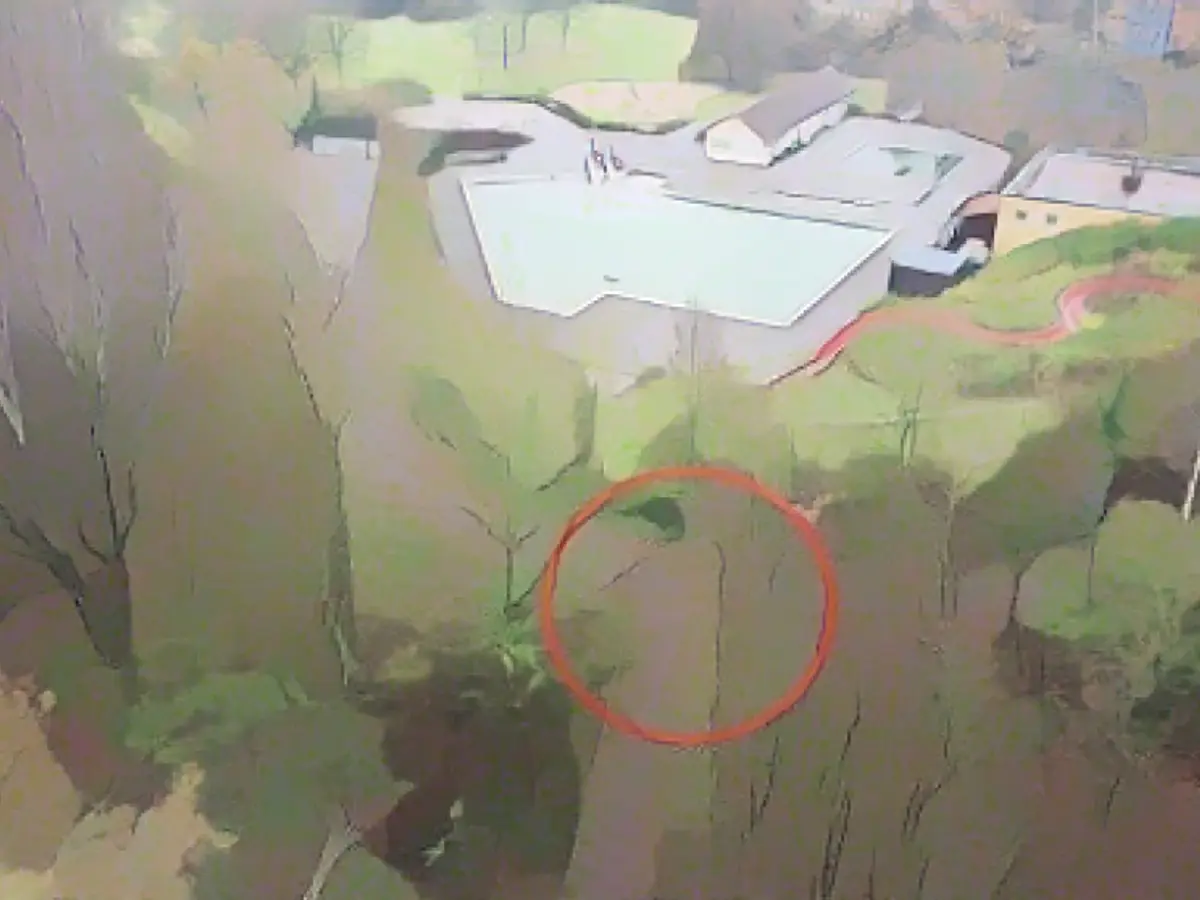 Execution while people were still splashing around next door?