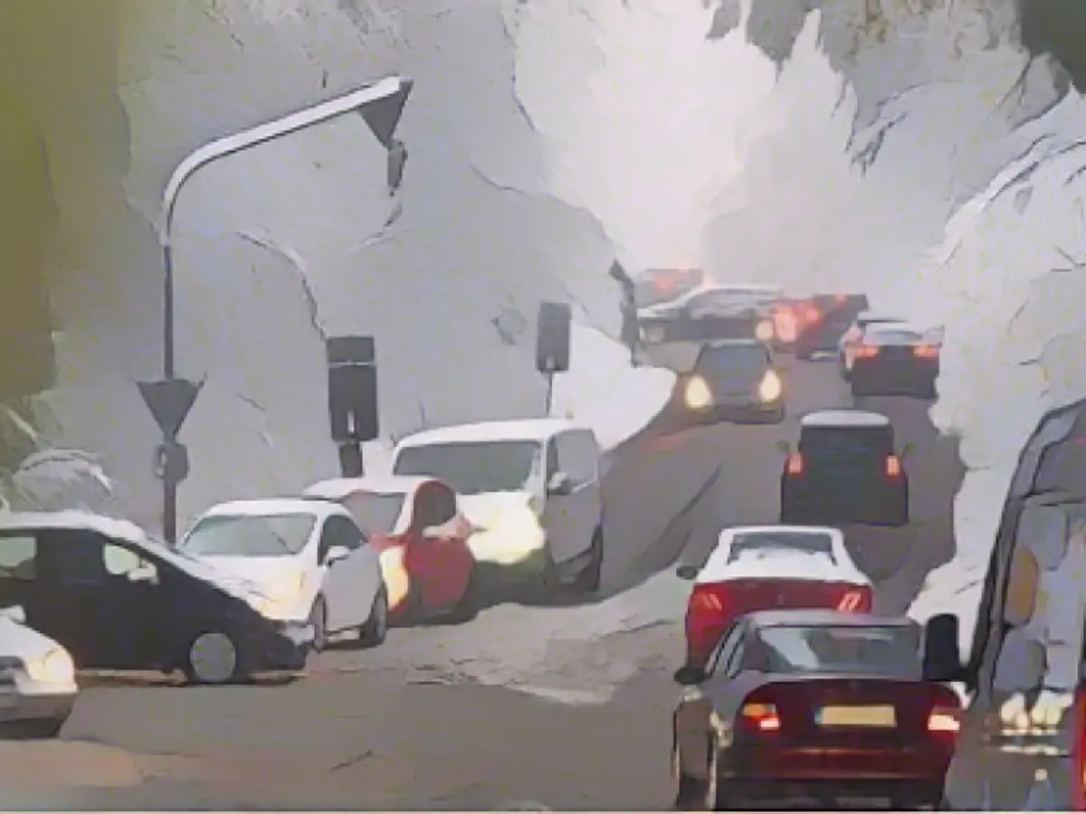 Drivers are stuck in snow-covered cars