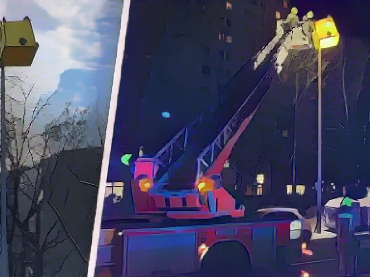 Fire department retrieves dustbin lampshade from lantern