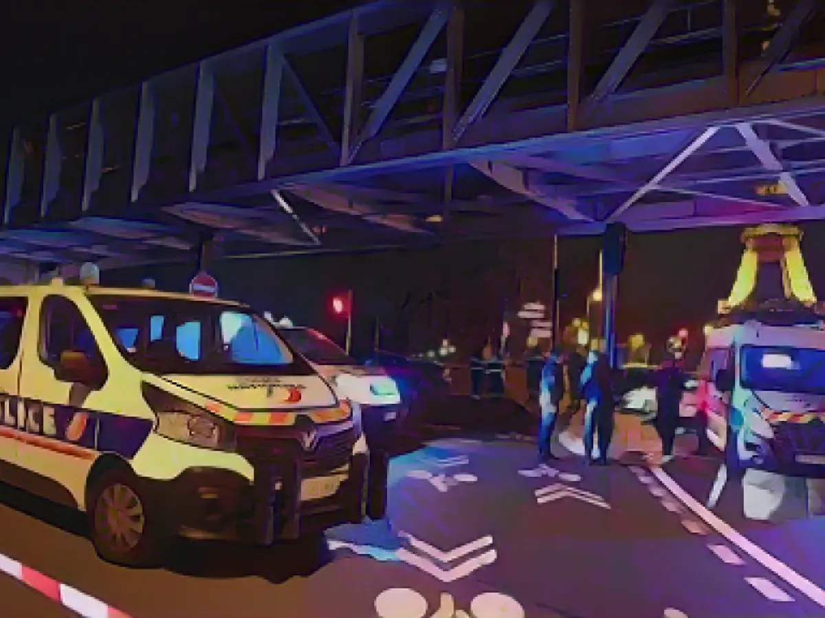 France's interior minister said one person was killed and two others injured in a knife and hammer attack near the Eiffel Tower in Paris