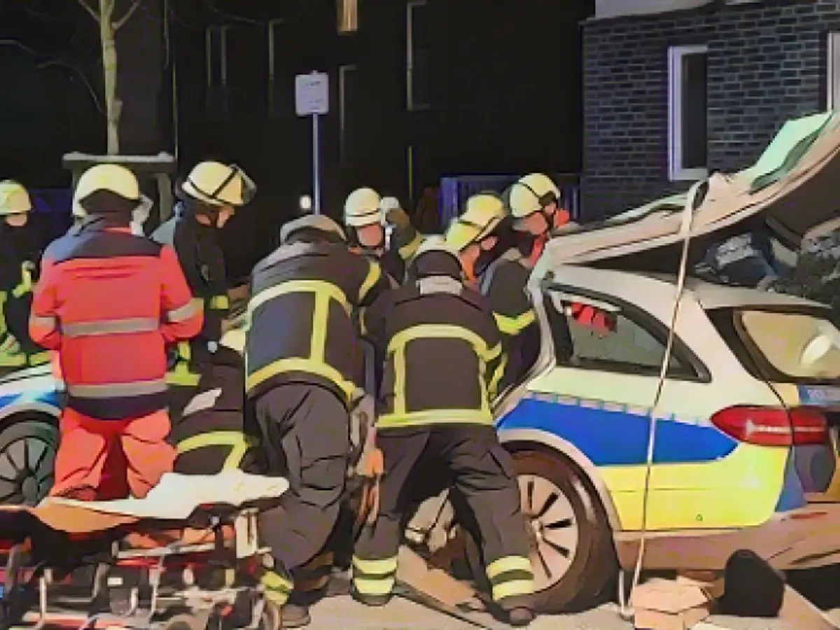 Rescuers fight for trapped police officers