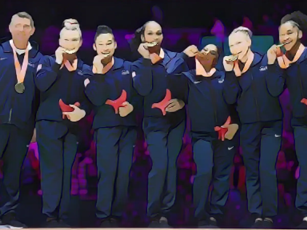 U.S. women's gymnastics team wins historic gold medal at world championships in Liverpool