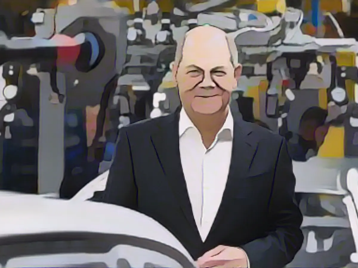 Scholz at BMW: Our country will get through this