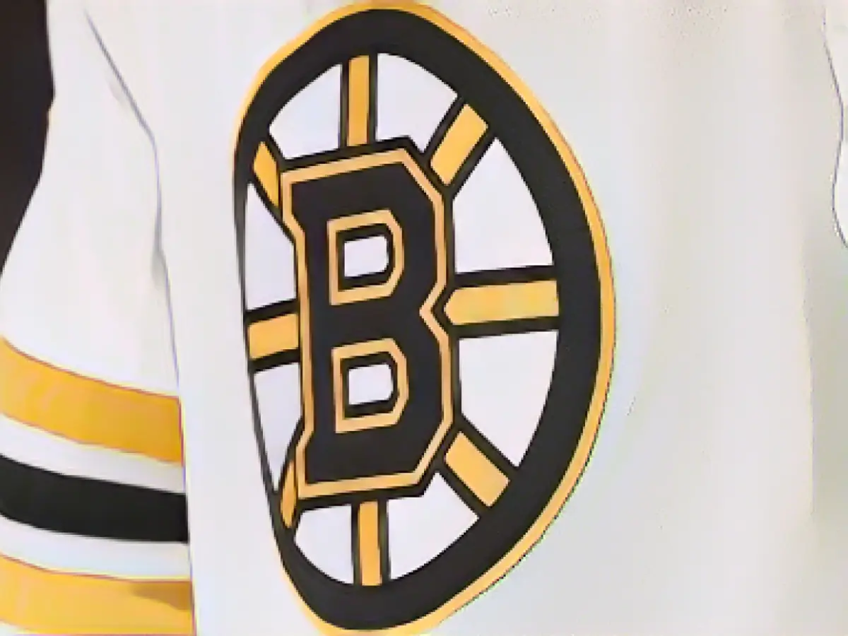 The Boston Bruins are signing a rookie who was embroiled in a bullying scandal