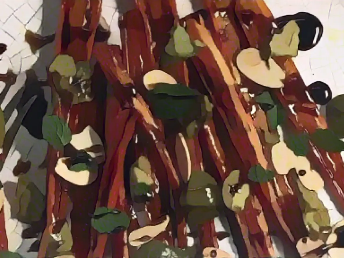 Easy Roasted Maple Carrots with Olives + Almonds + Mint