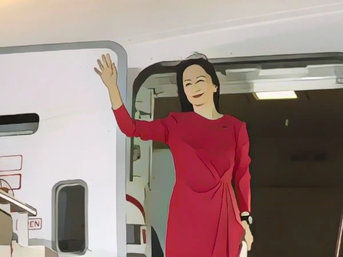 Huawei manager Meng Wanzhou released from Canada hailed as hero upon return
