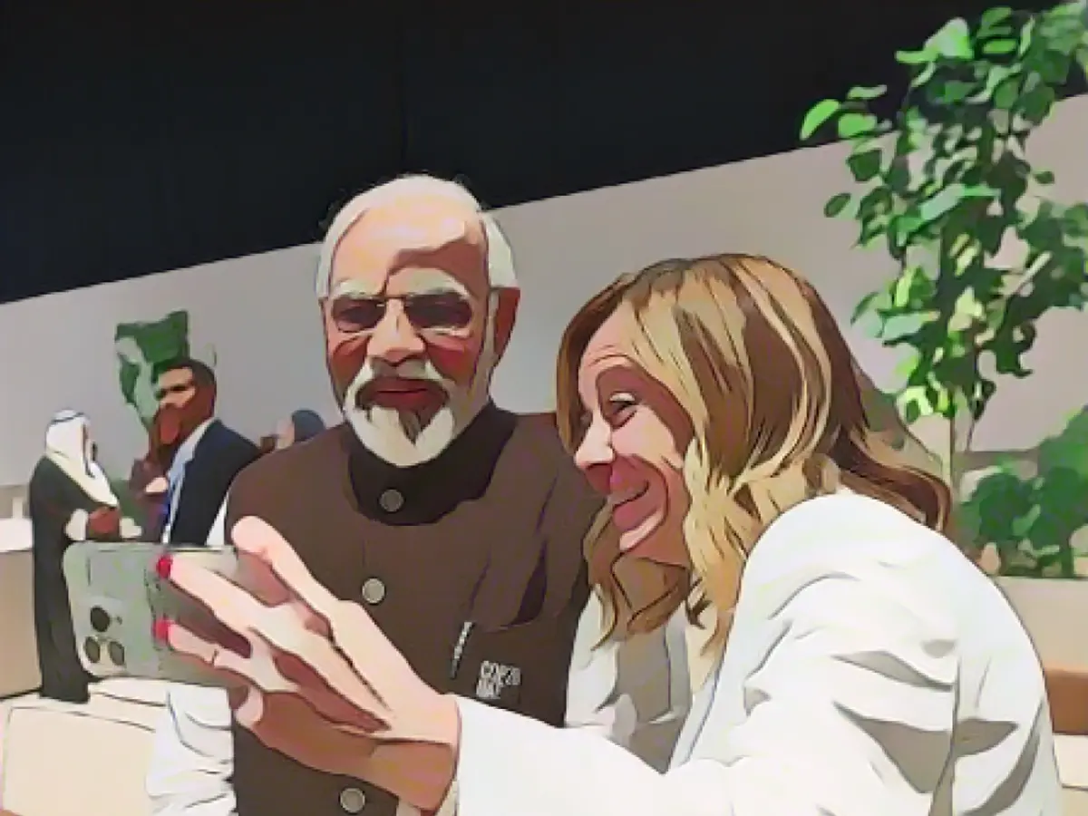 Meloni has a cell phone with encouraging slogans