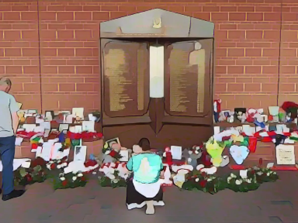 UK government signs Hillsborough Charter, recognizing 'multiple injustices' suffered by victims of football stadium disaster