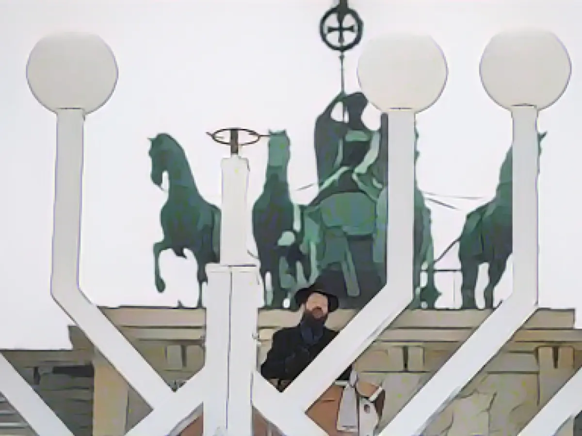 Hanukkah celebrations begin in Berlin with Chancellor Olaf Scholz