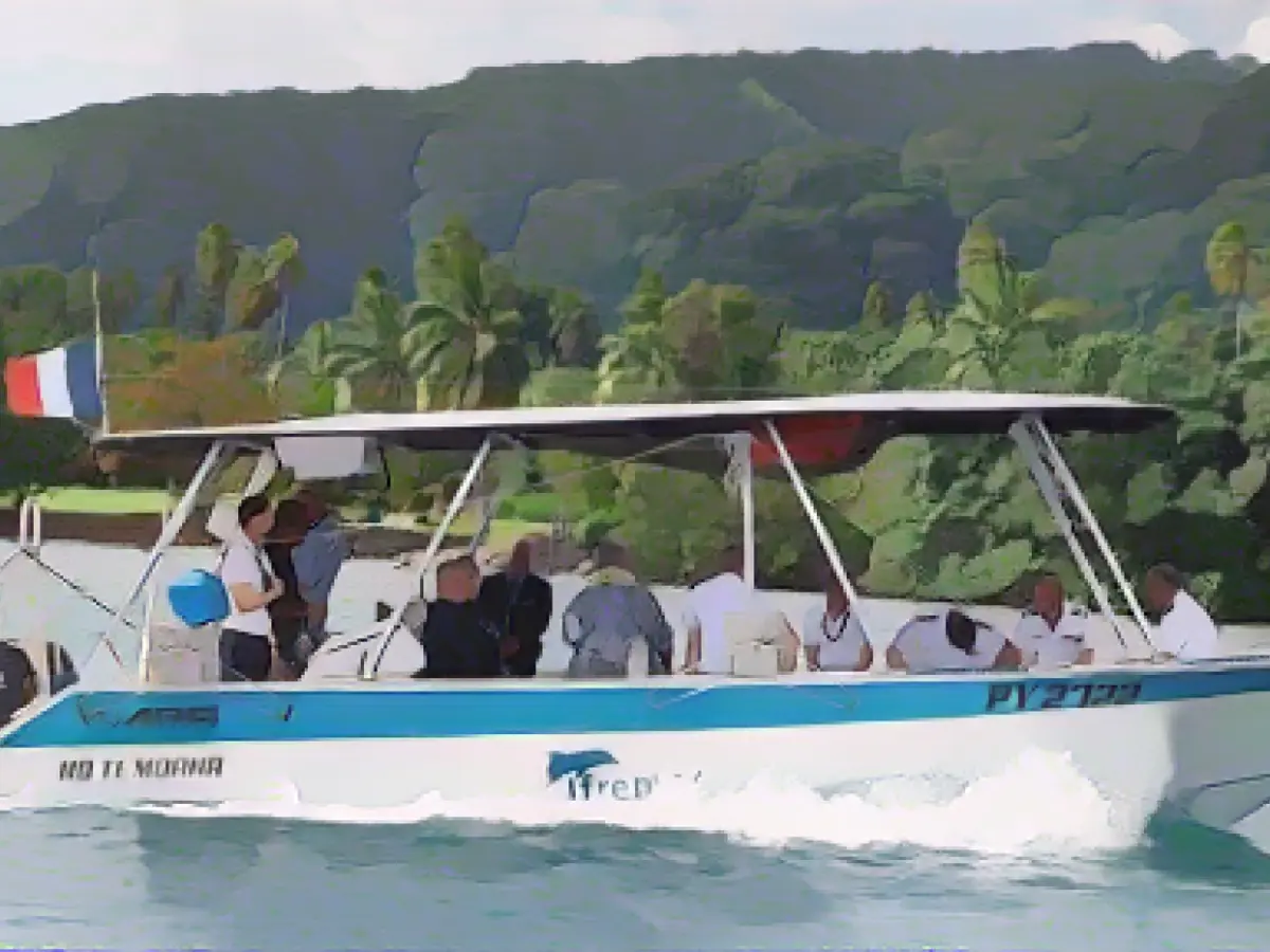 Construction of an aluminum tower being built for Olympic surfing competition in Tahiti has been halted after a barge damaged coral
