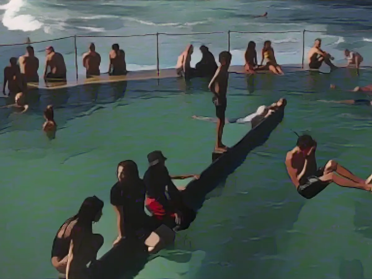 Australia faces extremely hot weather as rare early cyclone moves towards northern coast