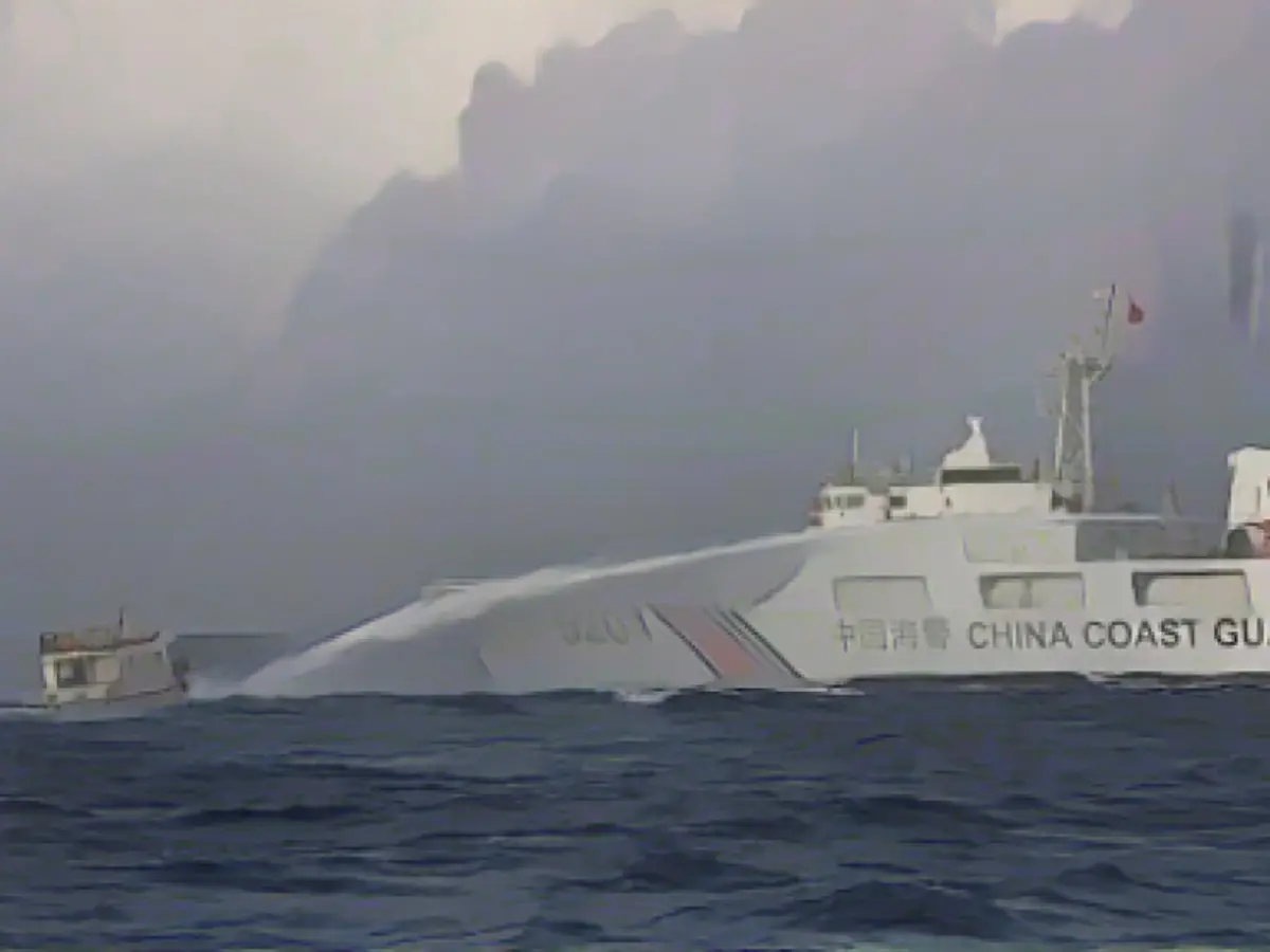 China ship fires water cannons