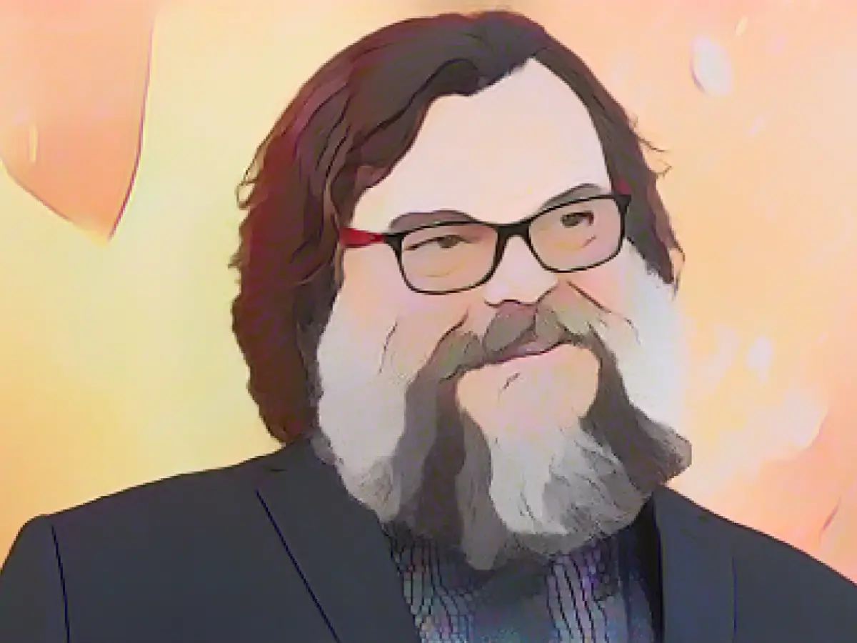 Jack Black performs Golden Globe-nominated song "Super Mario Bros." at Jonas Brothers concert.