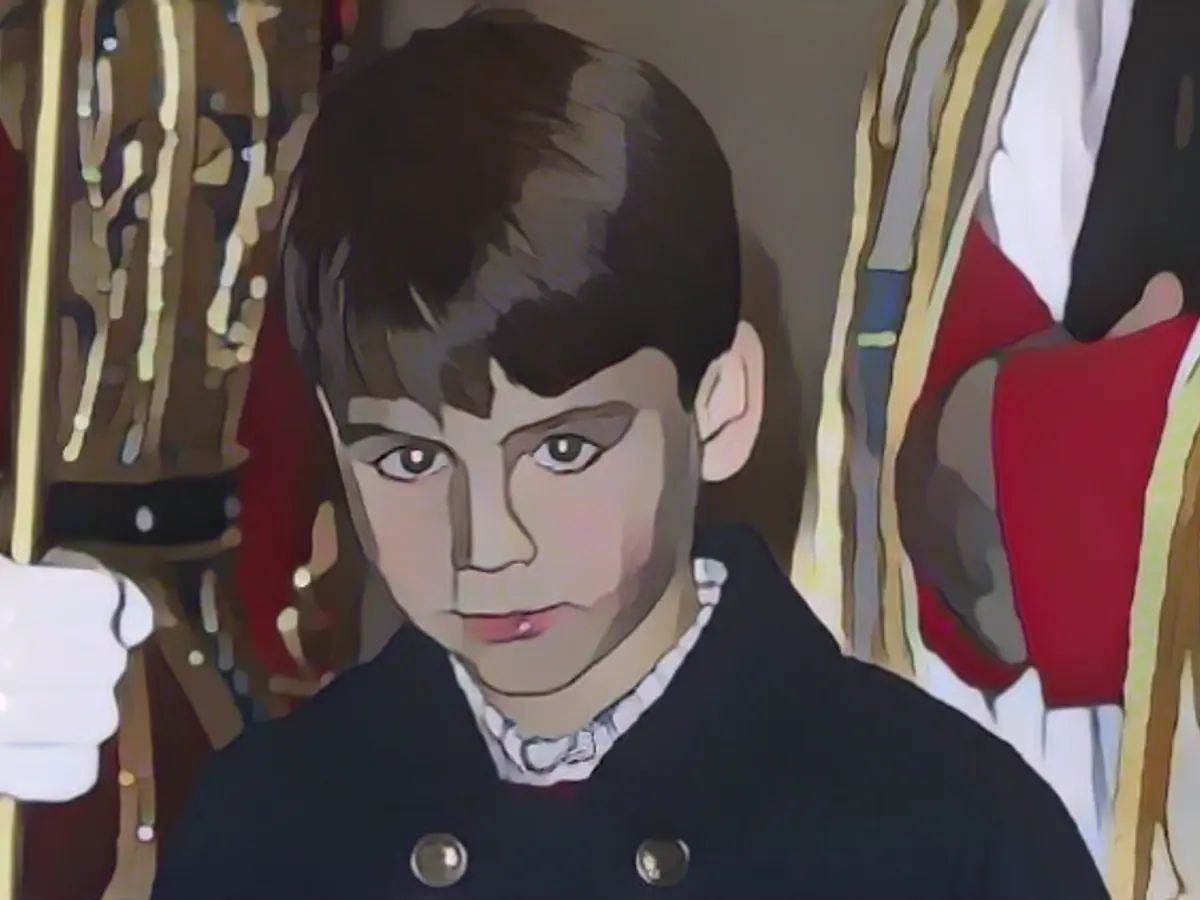 Prince Louis helps Santa Claus