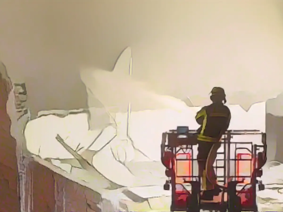 At least two dead in house fire - one child