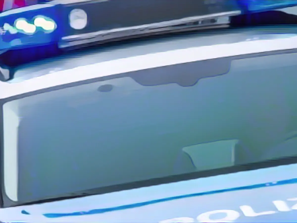 Climate activists spray Christmas trees with orange paint