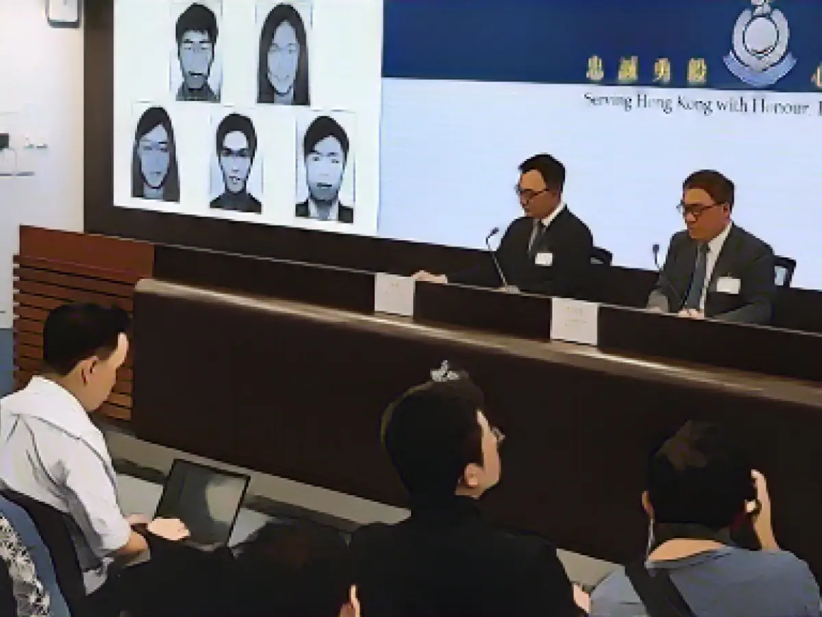 Hong Kong police are issuing new rewards for exiled activists, including a U.S. citizen