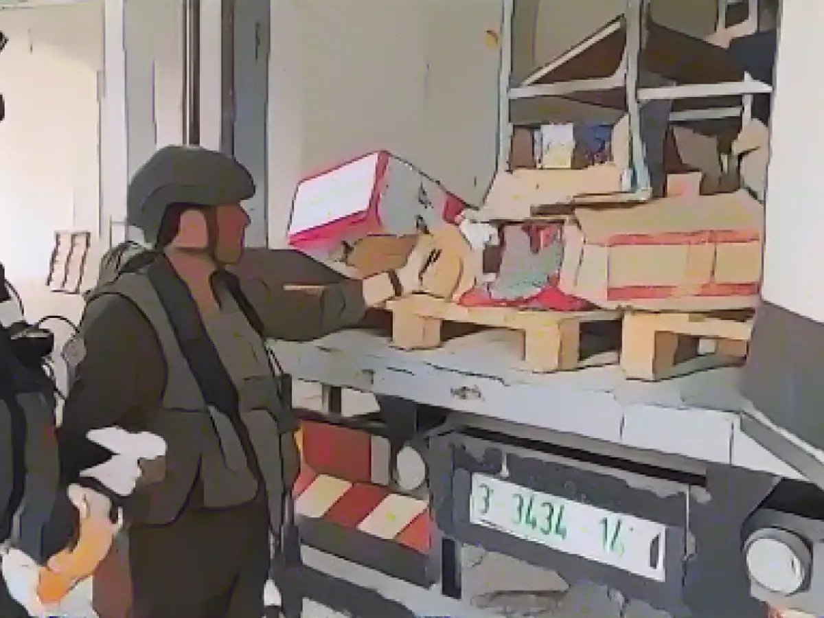 Video shows Israeli soldiers burning food, destroying shops and searching private homes in Gaza