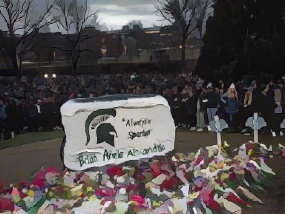 Michigan State University attorneys say the university is reaching a $15 million settlement with the families of three people killed in a February shooting