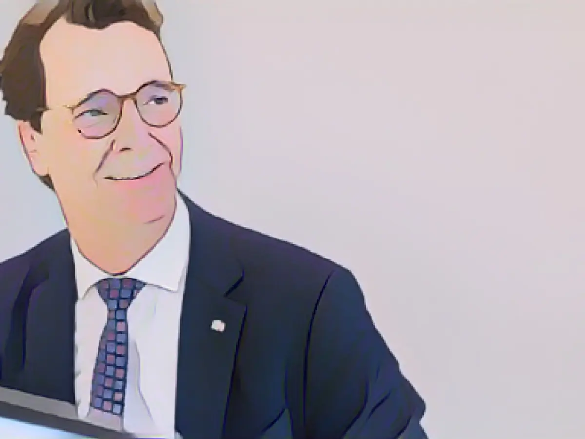 Wüst swings the wooden spoon for the family at Christmas