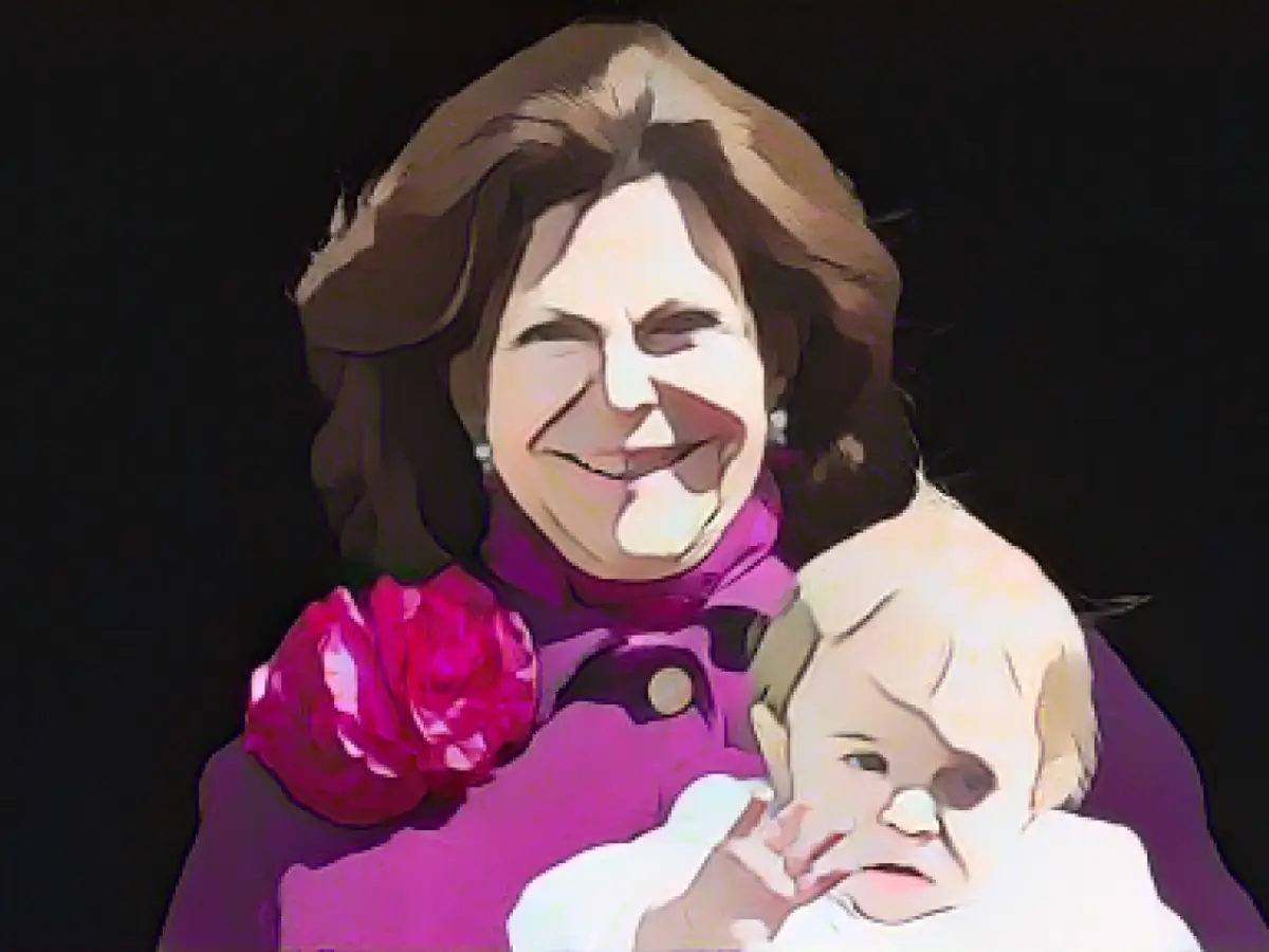 United with the grandchildren around the Christmas tree