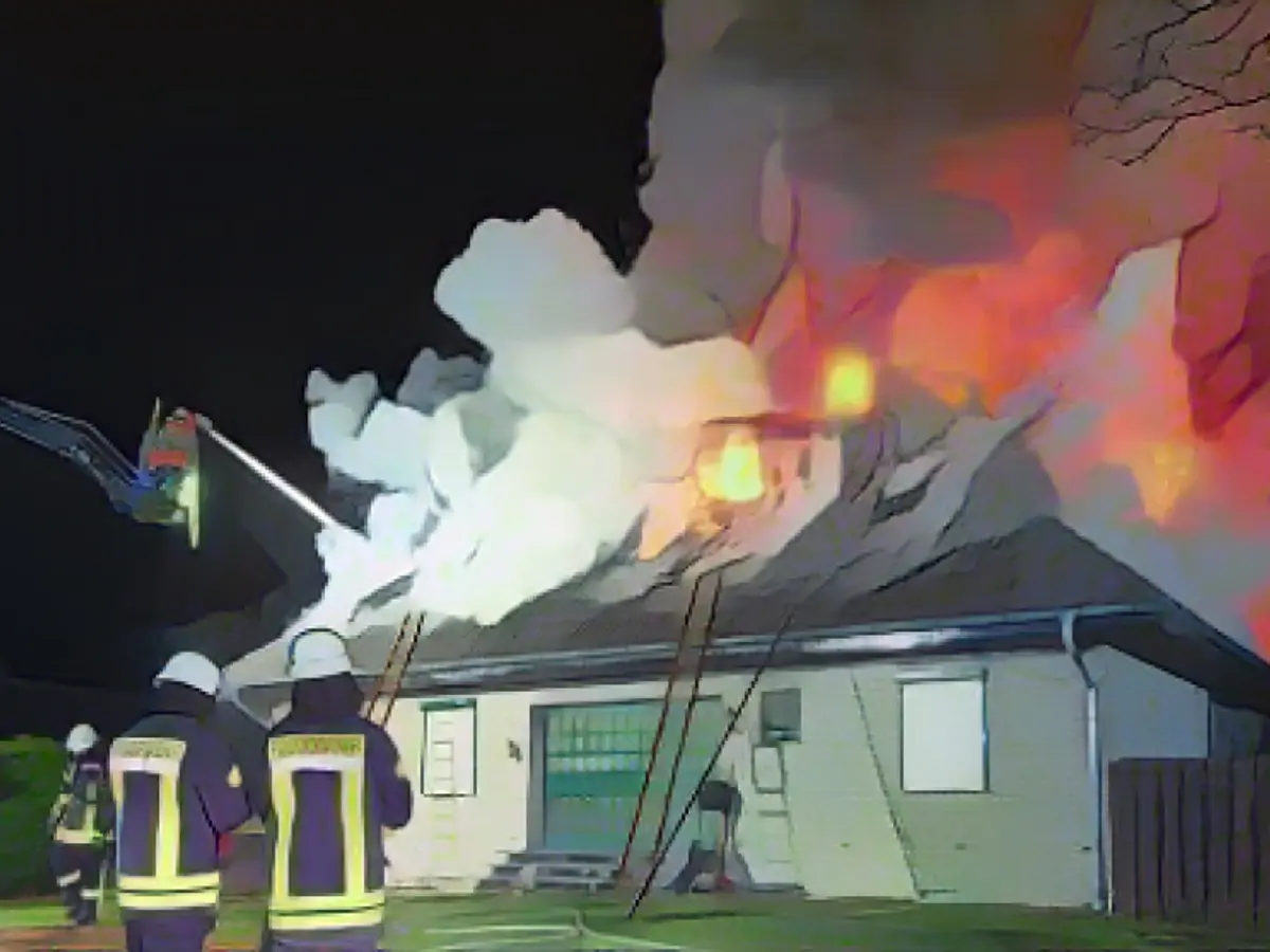 Flames consume roof truss