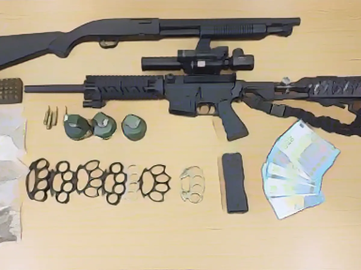 Assault rifle discovered in attic during raid!