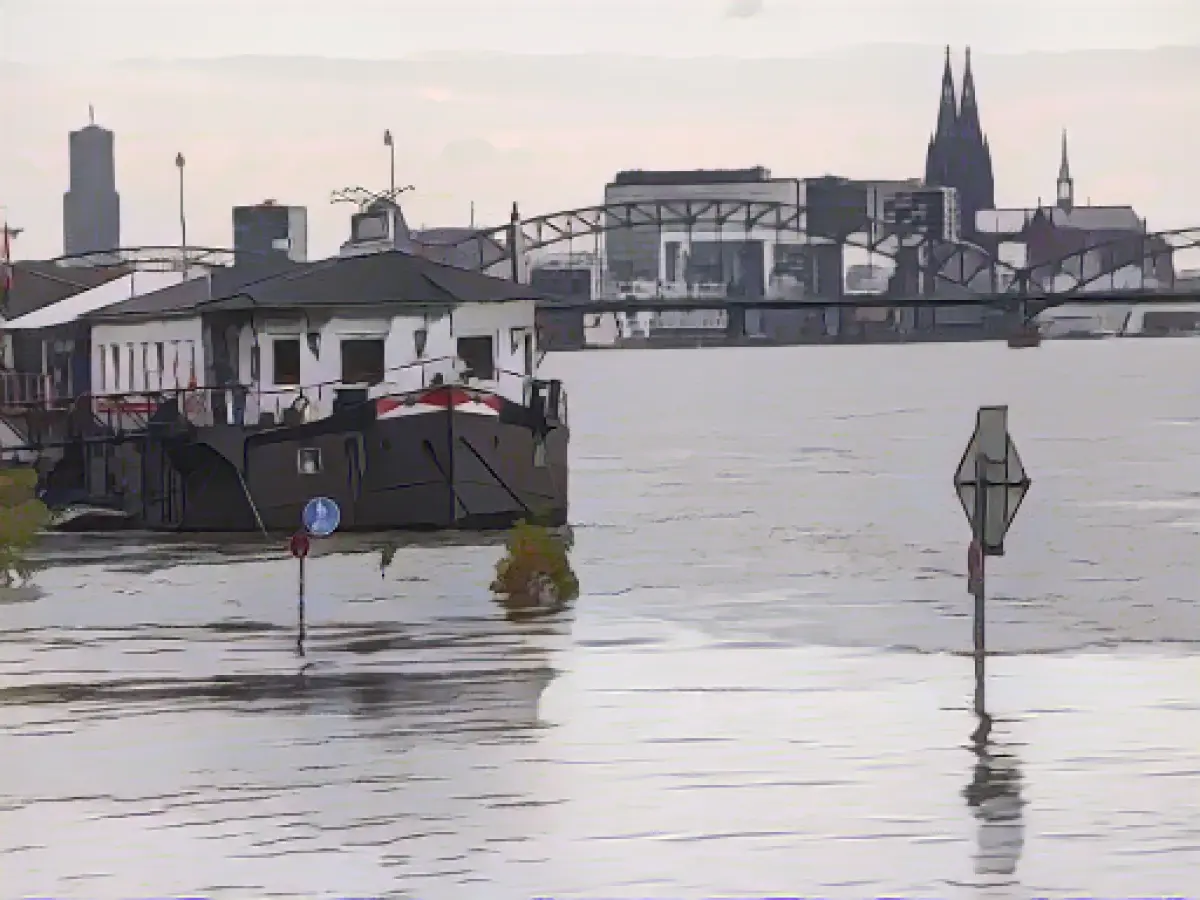 Benches in the water and slow boats: High water