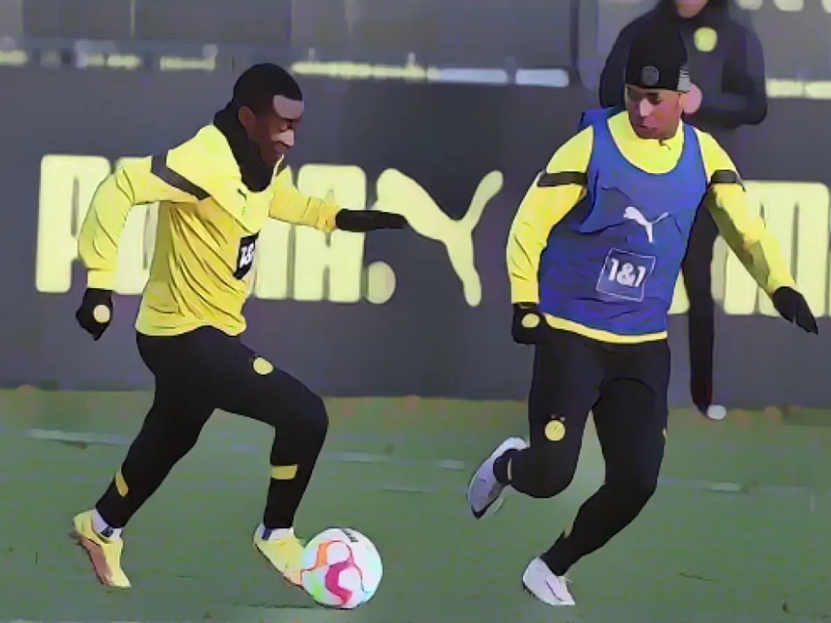 Moukoko fights for Adeyemi