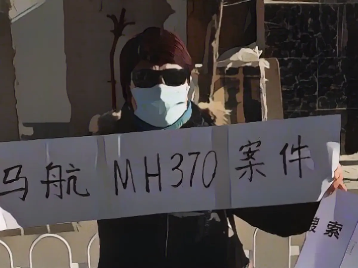 Survivors of flight MH370 demand renewed search