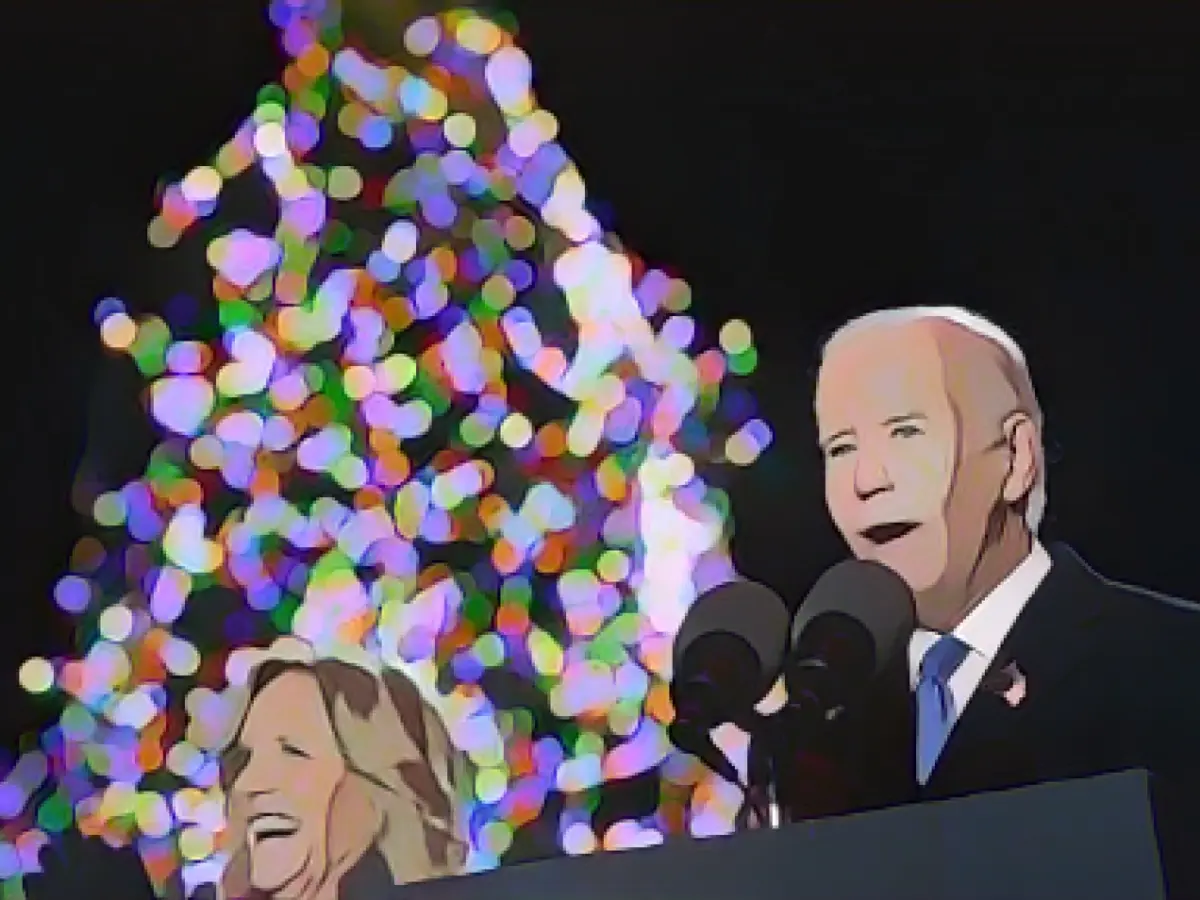 Bidens light up Christmas tree in front of the White House