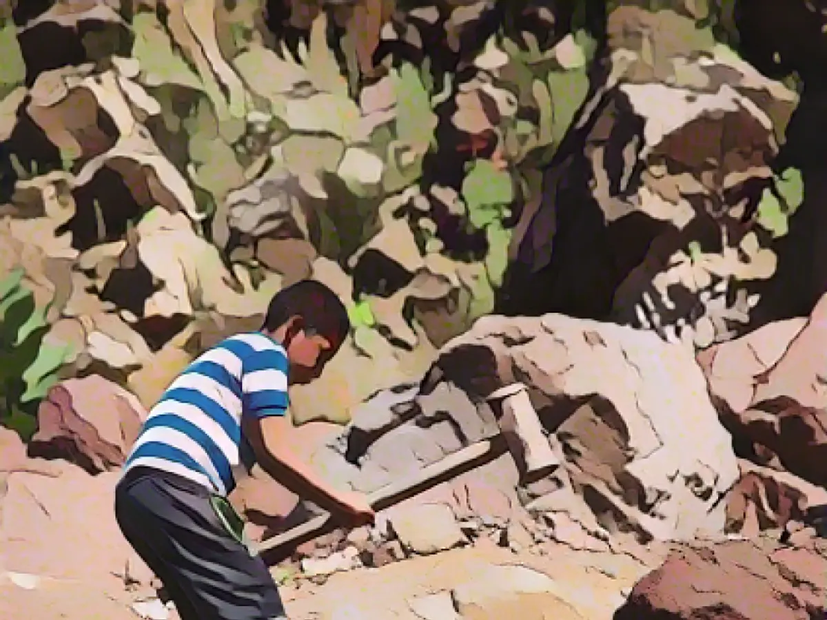 Juan (10) finally wants to swap a hammer for a pencil