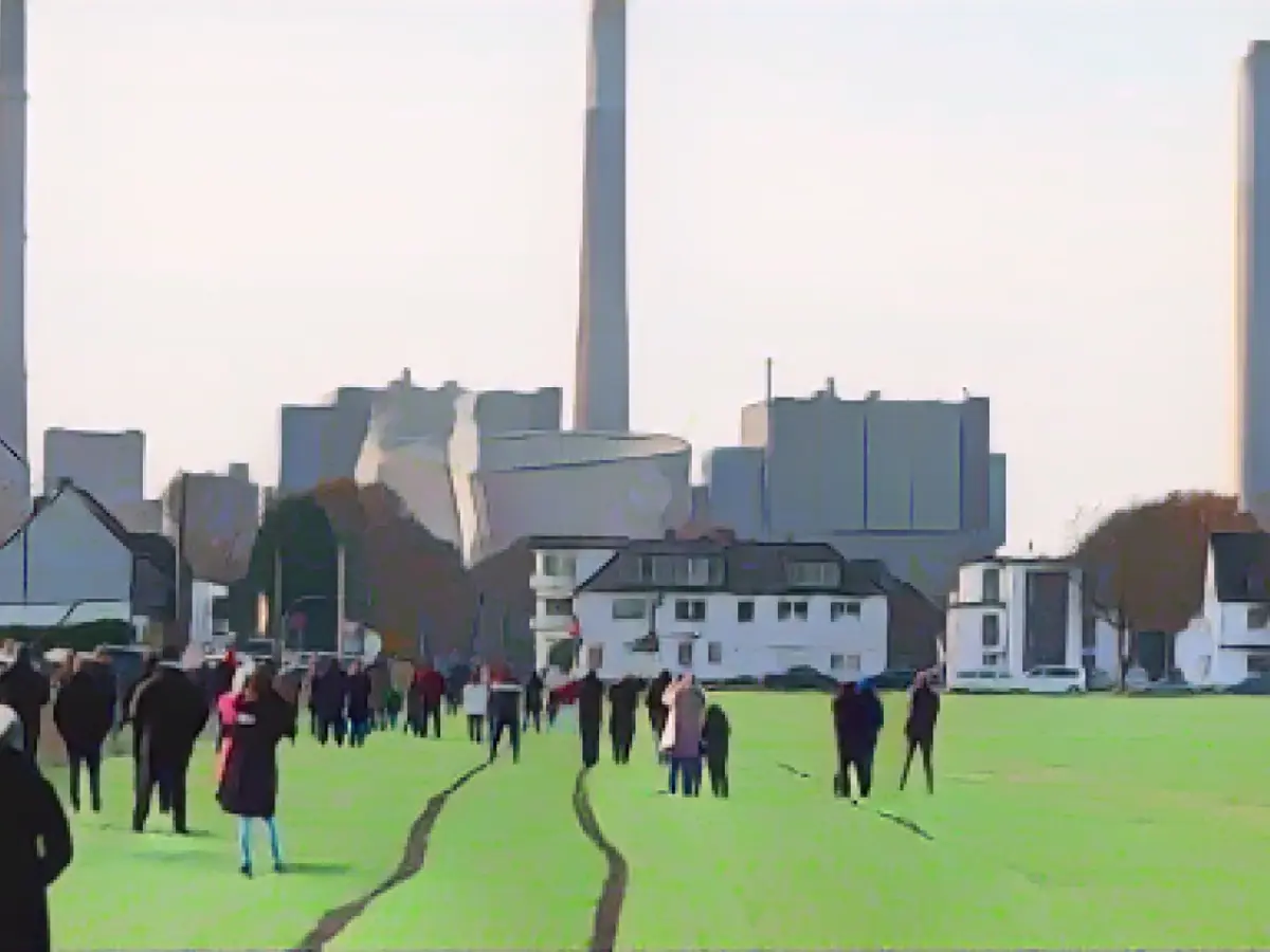 165-meter-high cooling tower of a coal-fired power plant blown up
