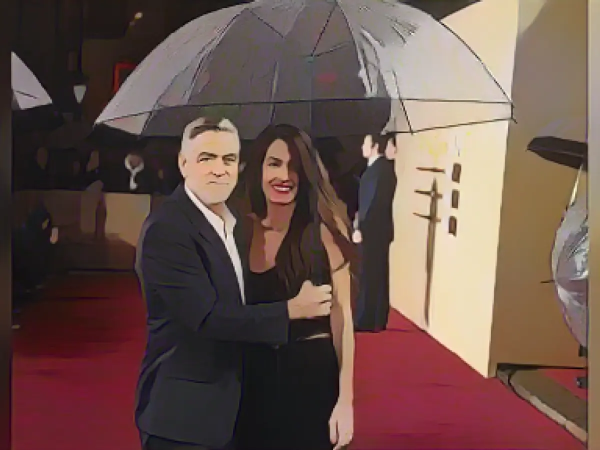 Loving appearance with wife Amal