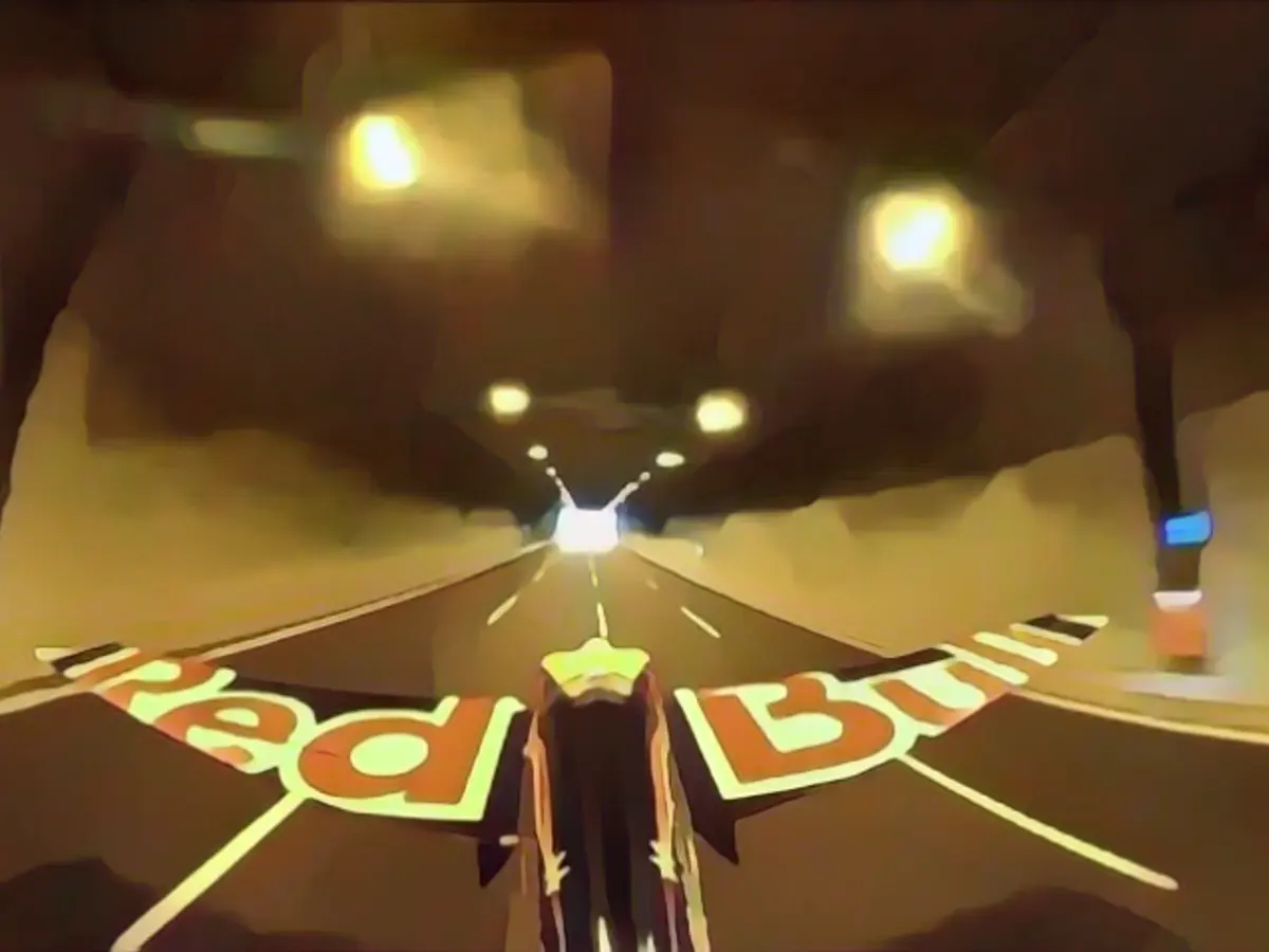 Watch a plane fly through a tunnel - while setting a Guinness World Record