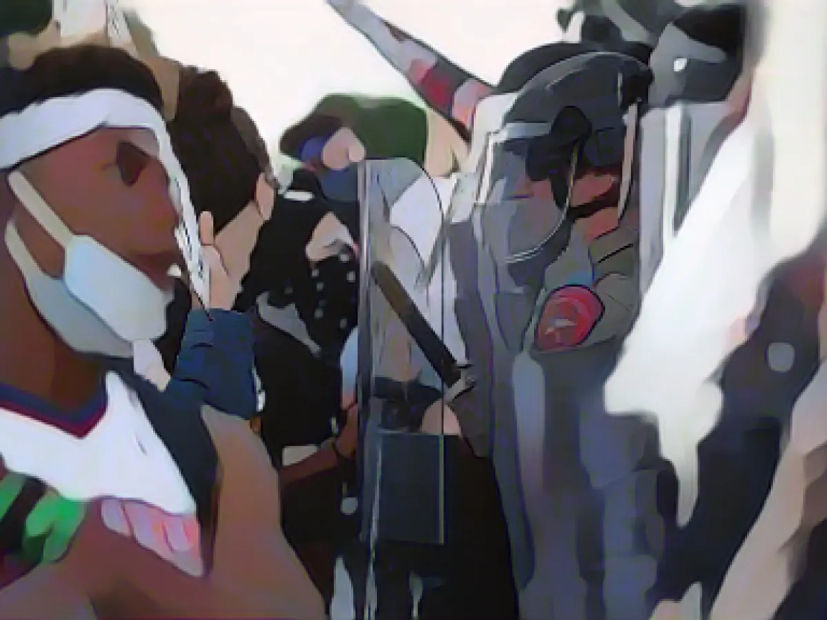 Assault charges against 17 Austin police officers during 2020 George Floyd protests are dropped as city officials call for Justice Department investigation